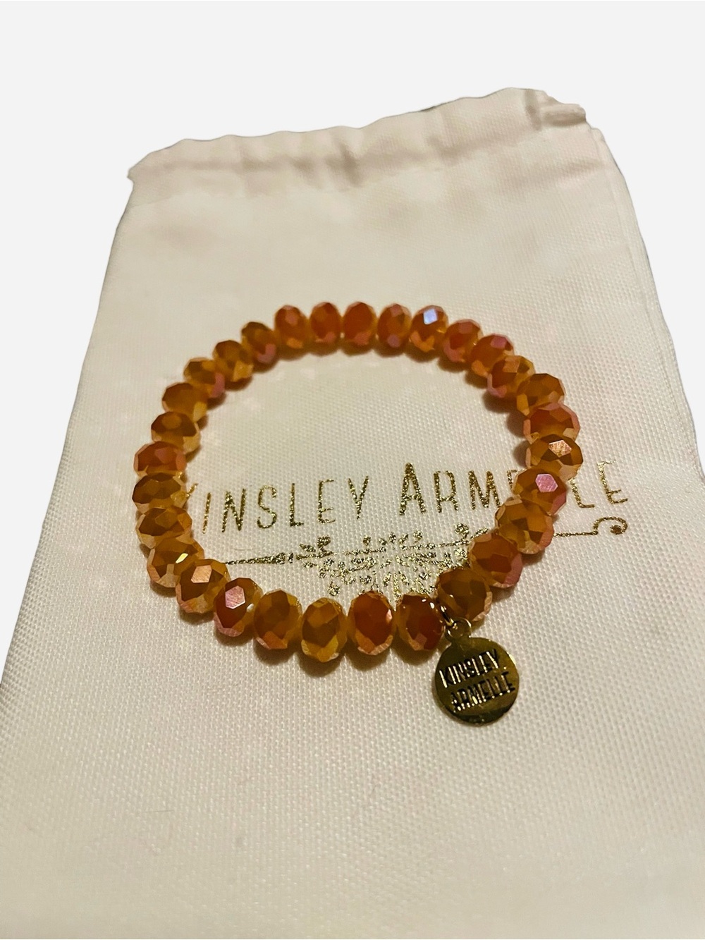 Kinsley Armelle Amber Faceted Bead Stretch Bracelet with Gold Logo Charm